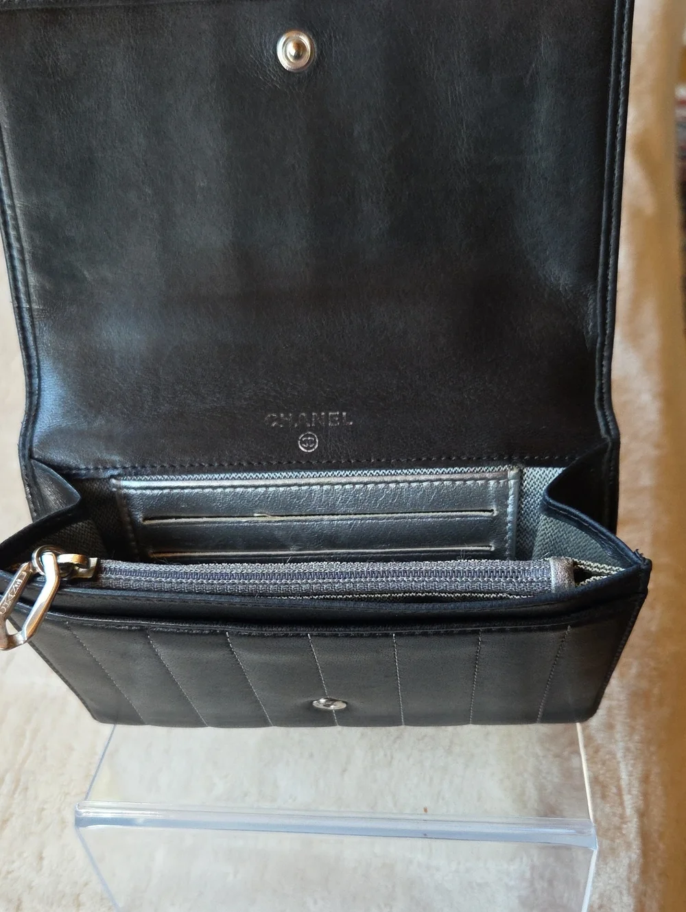 CHANEL Mademoiselle Black Vertical Quilted Leather Wallet with Silver CC Emblem